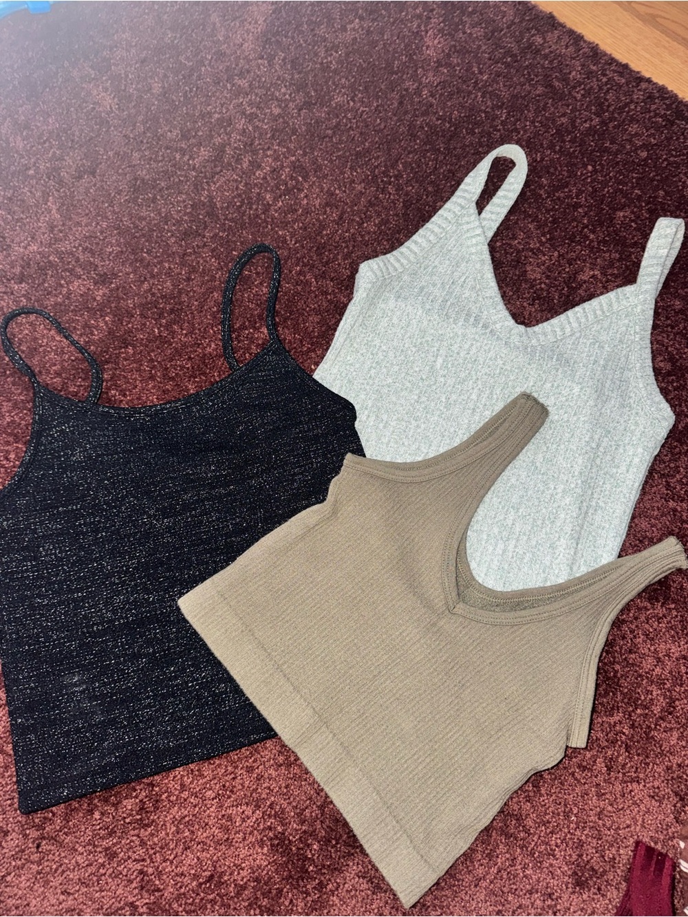 Blue, green, and black tank top set